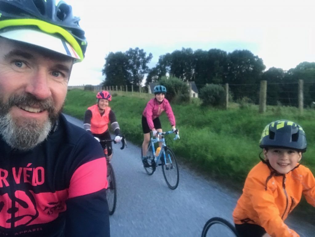 Scot Tares, Director of road cycling tour company, Skinny Tyres, out riding his bike with his family around Highland Perthshire.