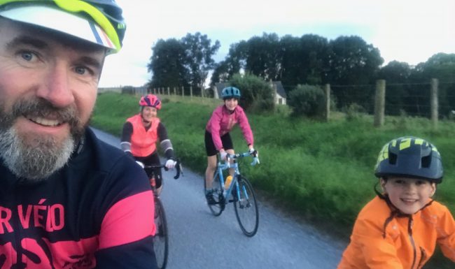 Scot Tares, Director of road cycling tour company, Skinny Tyres, out riding his bike with his family around Highland Perthshire.