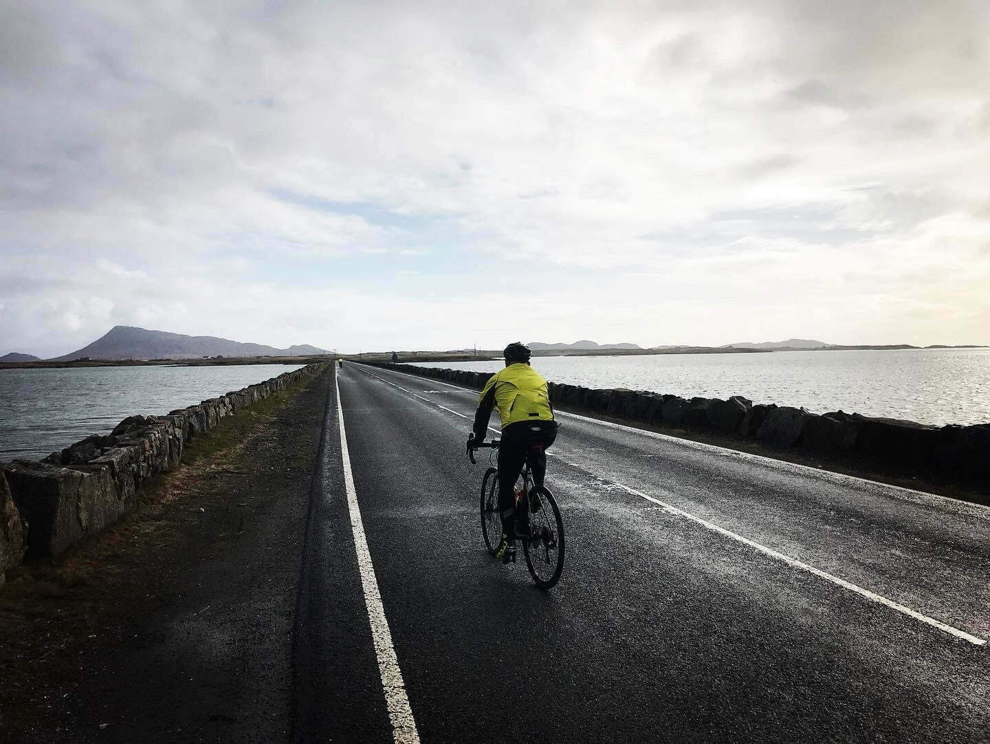 Cycling across a causeway on the way to the Outer Hebridean Island of North Uist
The Hebridean Way - Cycling from Barra to the Butt of Lewis
