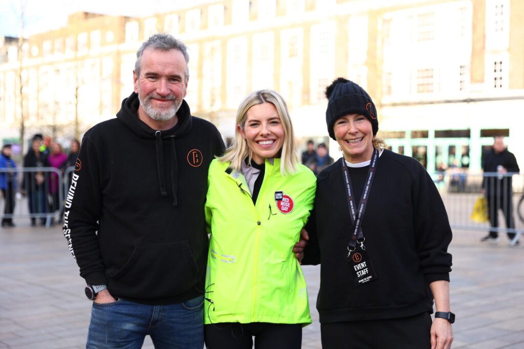 Scot Tares, Mollie King and Tracy Corbett at the finish line of Mollie King Pedal Power Challenge for BBC Comic Relief and Red Nose Day