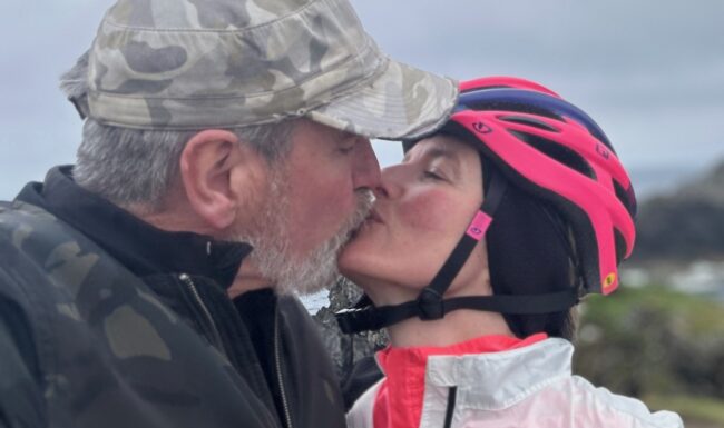 Cycling guide Scot, who runs cycling tours and holidays in Scotland shares a kiss on the Hebridean Way.