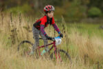 Bicycle race - A young girl races cross country on her mountain bike in Scotland