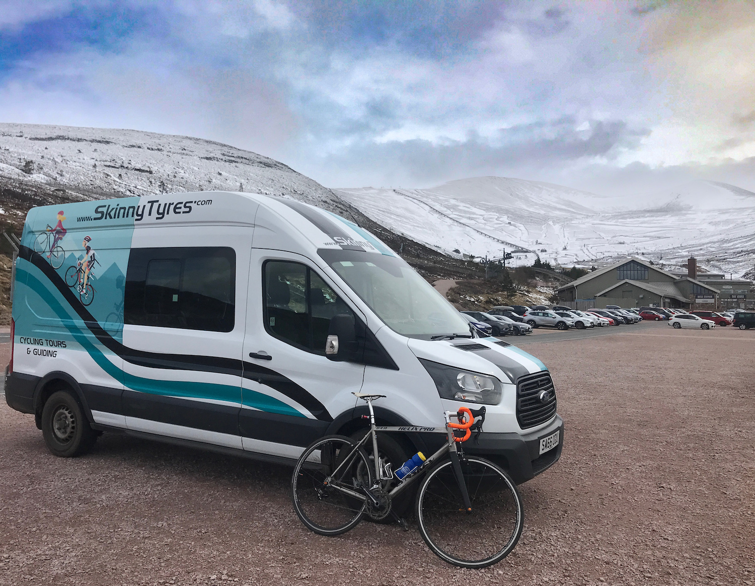 The Skinny Tyres van sits in the Cairngorm ski station car park